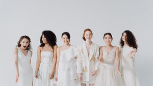 a diverse group of brides and bridesmaids gather for a wedding celebration 