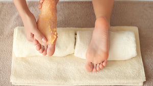 image of someone massaging their feet with a natural homemade foot scrub